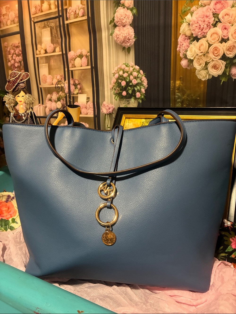 Anne Klein Elegant Blue Leather Tote with Gold Charm Accent